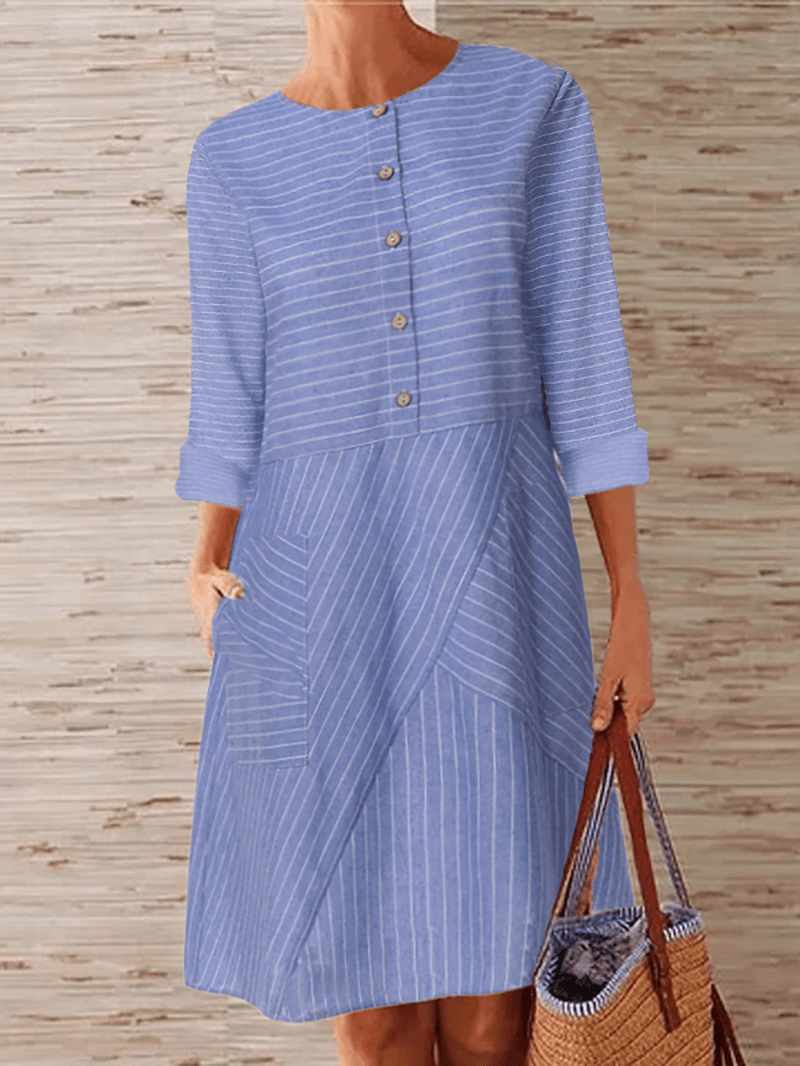 Comfortable Women's Printed Dress with Functional Pockets and Button Front